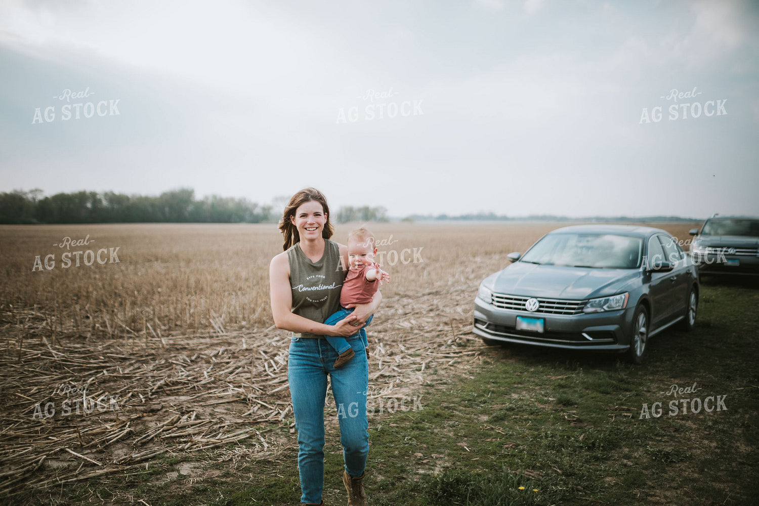 Farm Mom and Kid Arriving at Field During Planting 5600