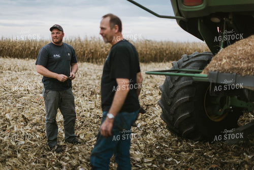 Farmers Talking by Combine 8623
