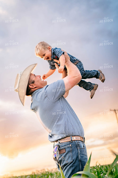 Rancher and Son in Cornfield 218046