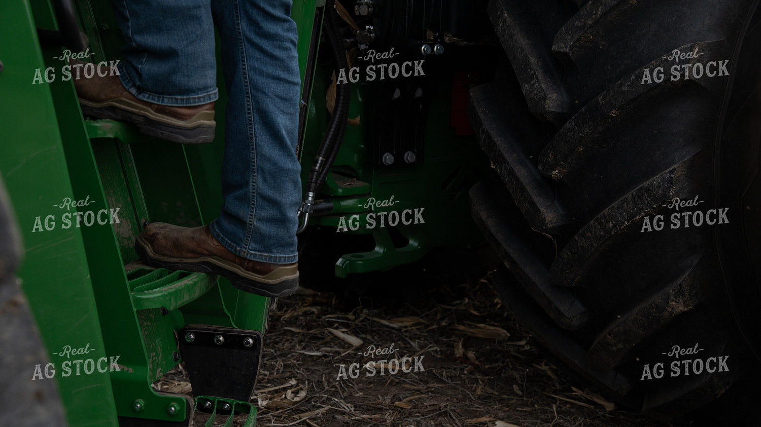 Farmer Climbing into Tractor 26143