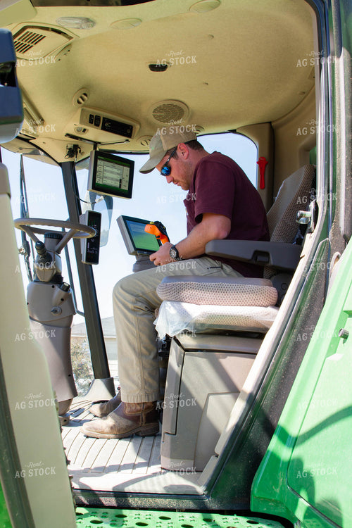 Farmer in Combine 79159