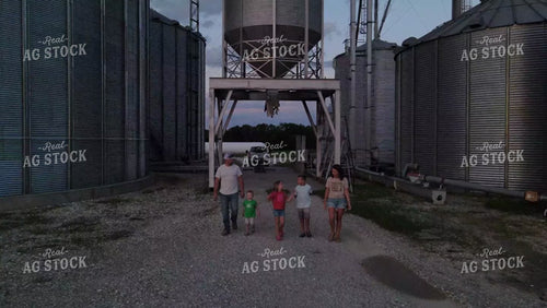 Farm Family Walking by Grain Bin 9165
