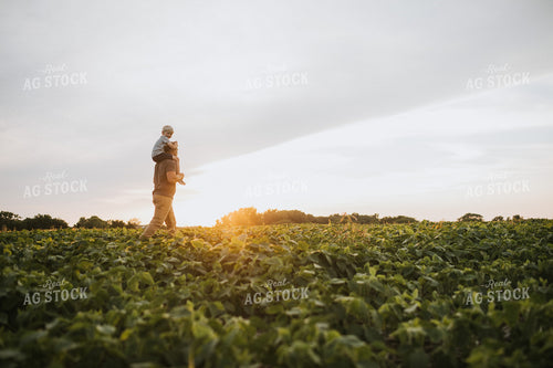 Farmer and Farm Kid in Field 6020