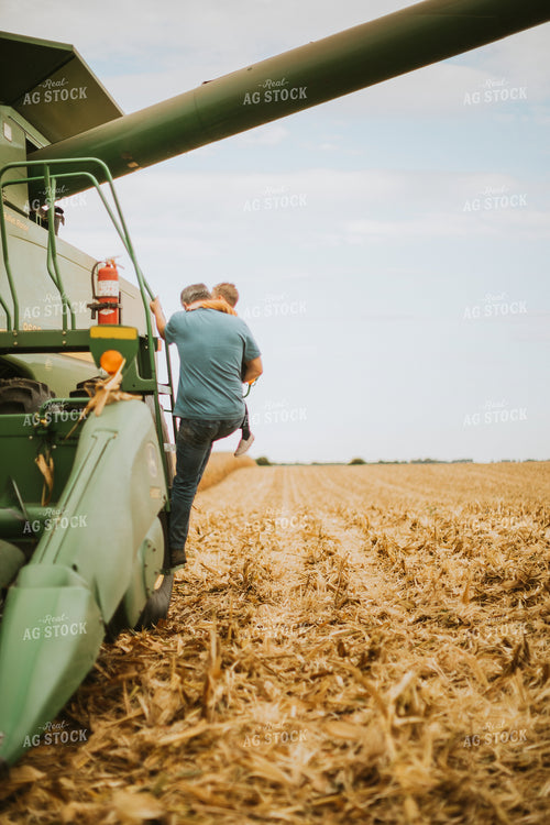 Farm Kid and Farmer Getting Out of Combine 6607