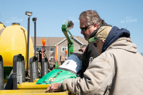 Farmers Filling Planter Boxes 157302