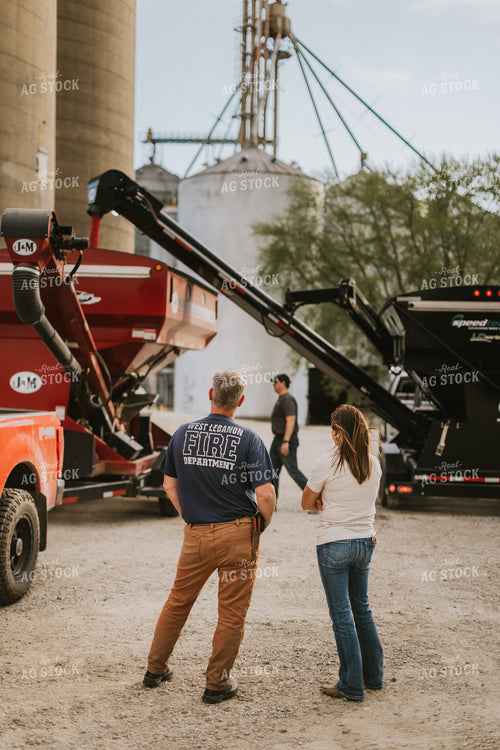 Farmers Talk While Delivering Seed 7601