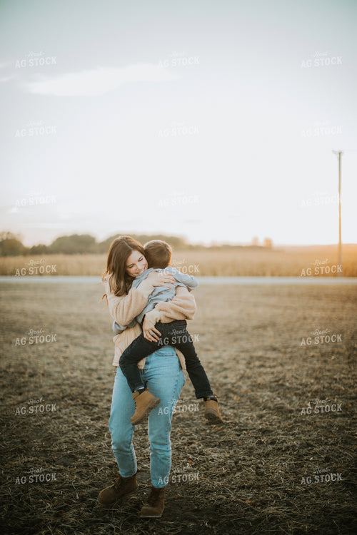 Farm Mom Hugging Son 6750