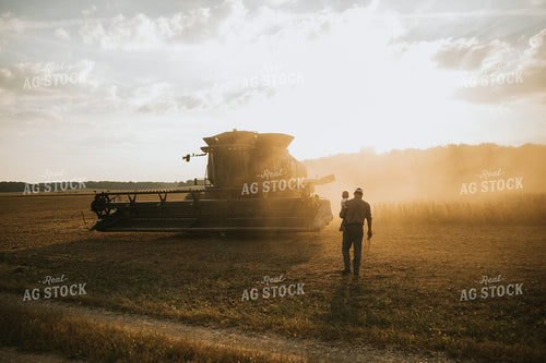 Farmer and Farm Kid Getting into Combine 4829