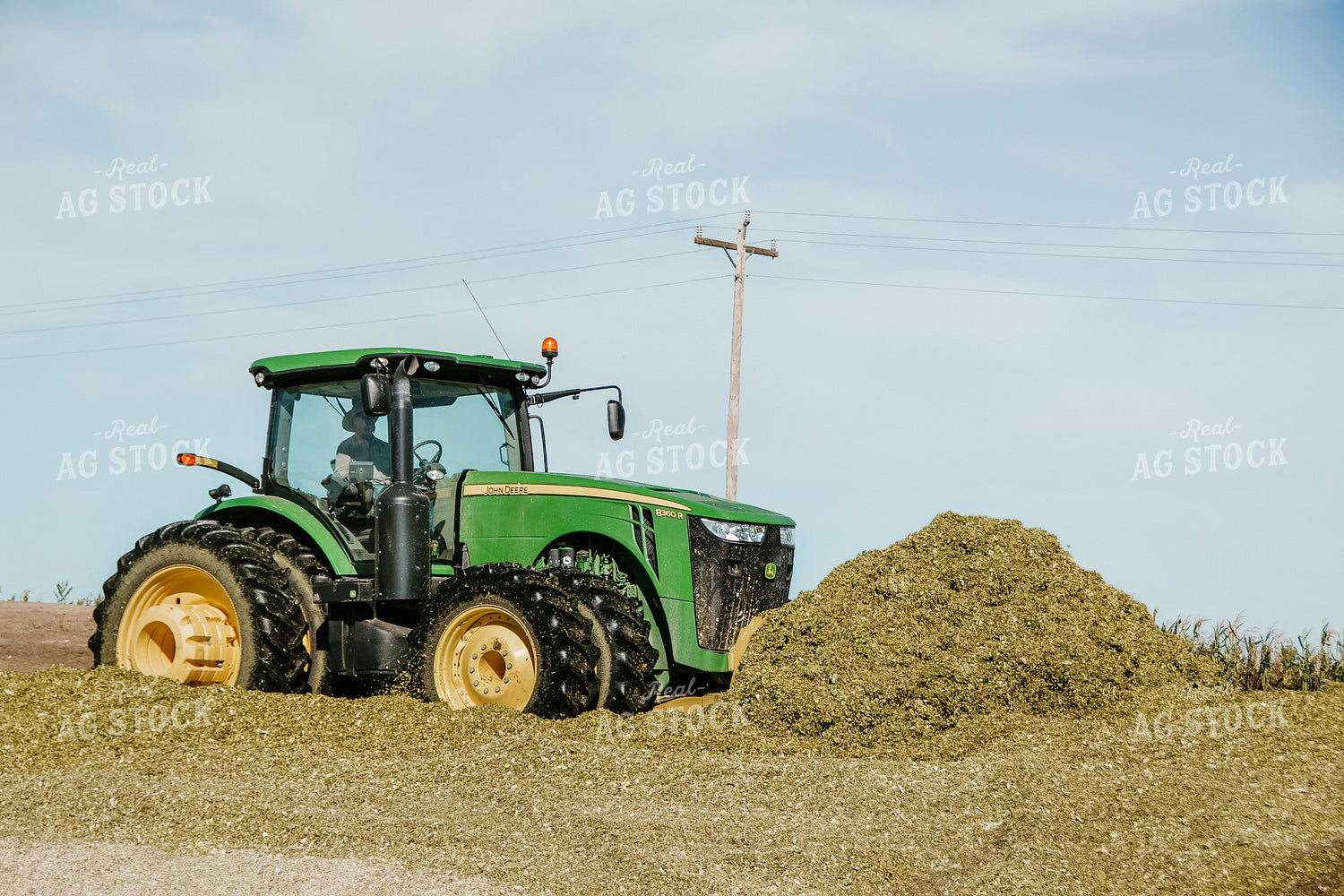 Tractor with Silage Pile 64072