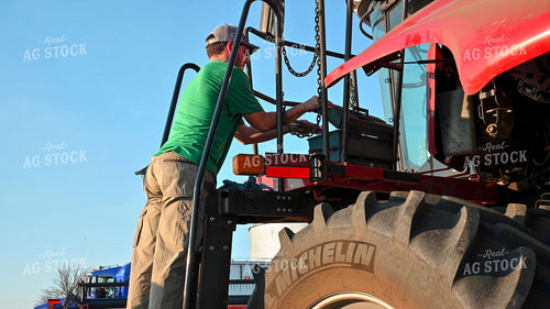 Multigenerational Farm Familiy Repairing Combine in a Bean Field 25518