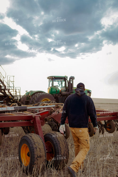 Farmer Checking Equipment 187380