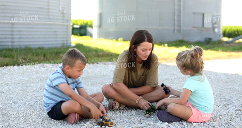 Farm Family Playing with Toy Tractors 6506