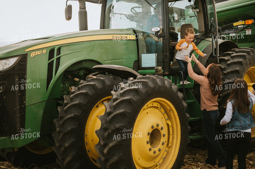 Farm Family Near Tractor 6599