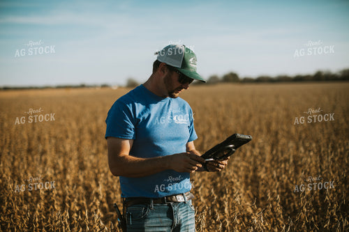 Farmer in Field with Tablet 7164