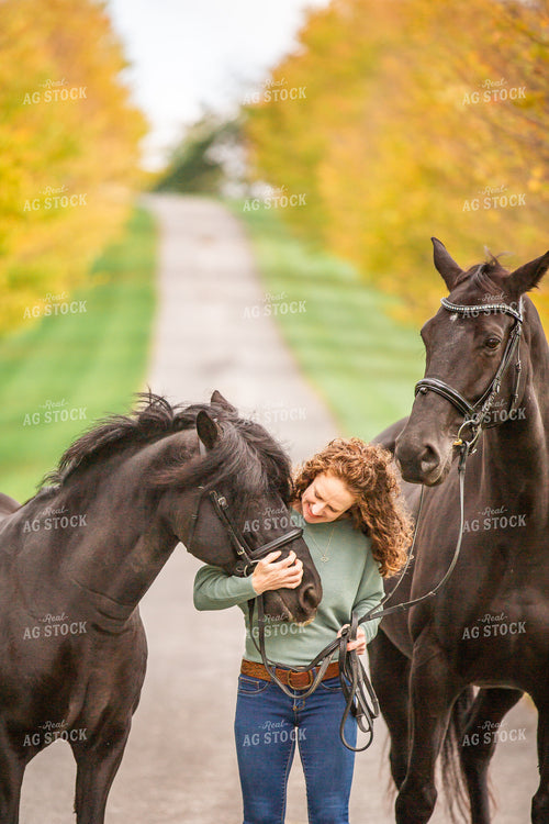 Female Equestrian with Horses 270393