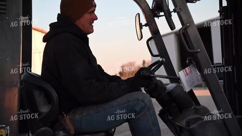Loading the Seed Tender with a Skidsteer - 065