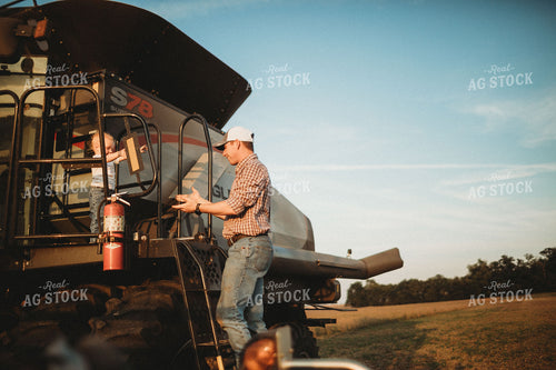 Farmer Helping Farm Kid Down Combine Ladder 4866
