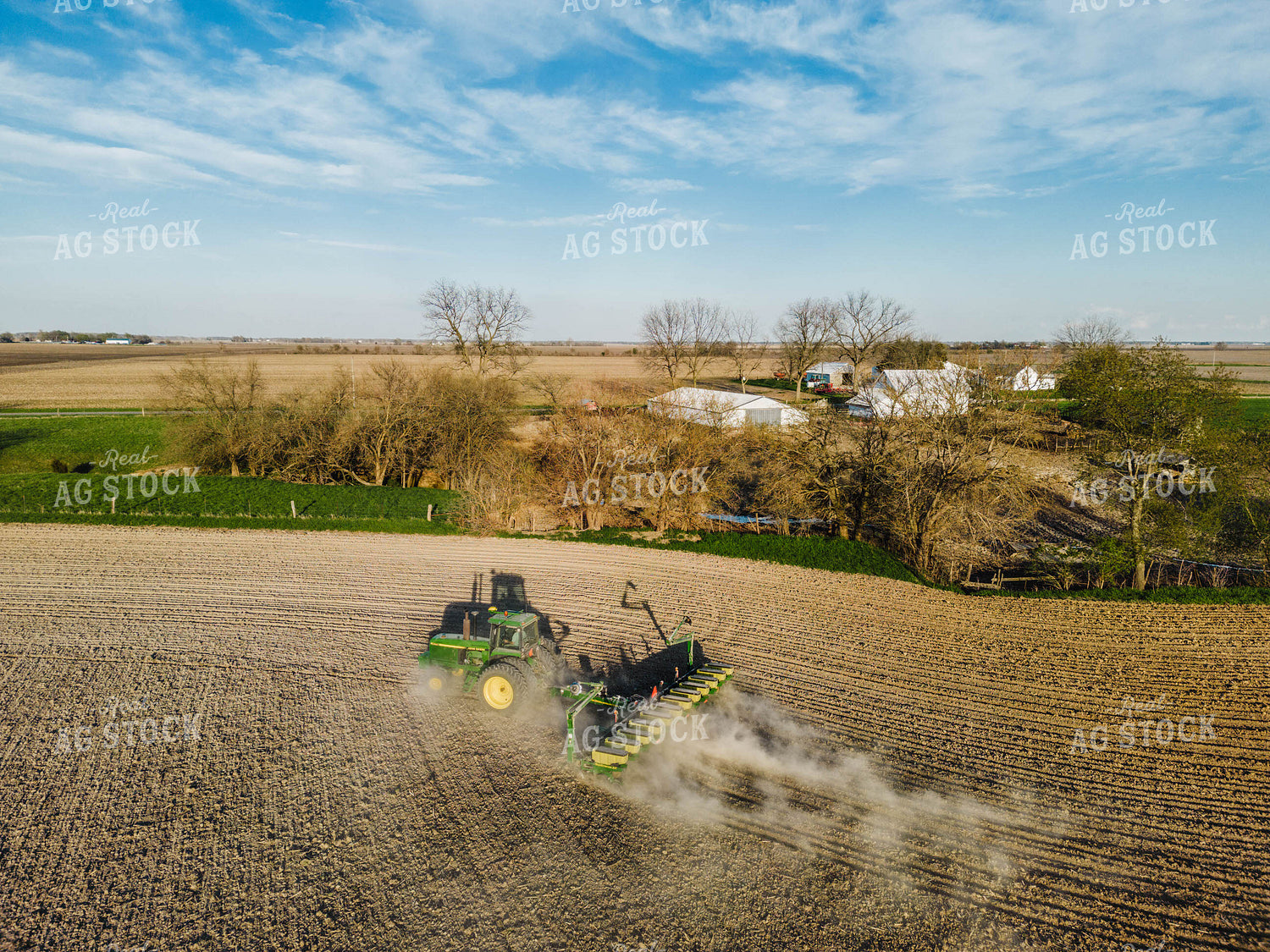 Tractor Planting Field with Farmstead in Background 115068