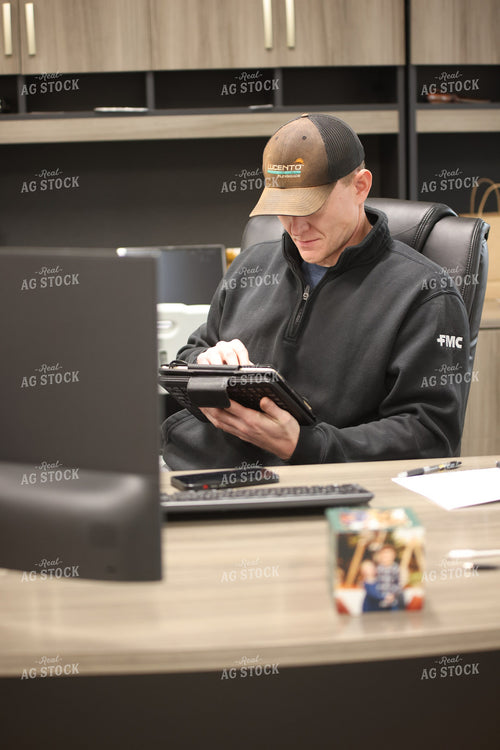 Farmer Using Tablet in Office 161114