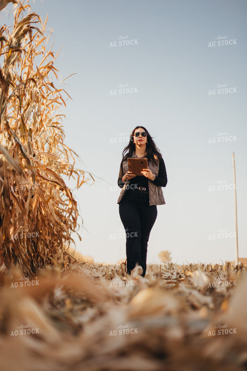 Female Appraiser Valuating Land 9449