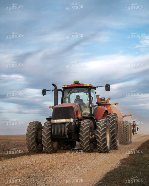 Manure Spreader Traveling on Road 289043