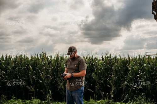 Farmer Holding Drone 196340