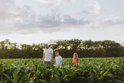 Farmer and Kids Checking Corn 8783