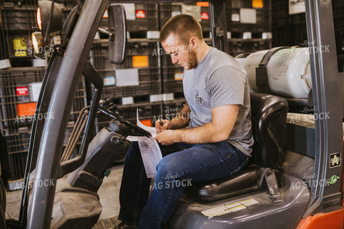 Forklift Operator Signing Paperwork 5333