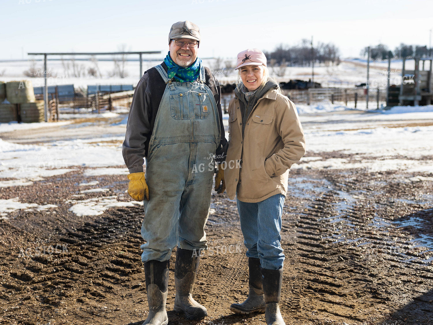 Ranchers Smiling on Farm 70236