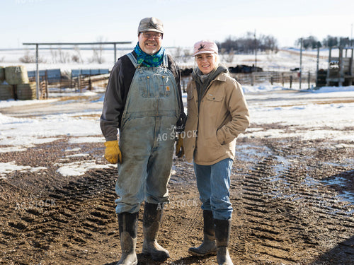 Ranchers Smiling on Farm 70236