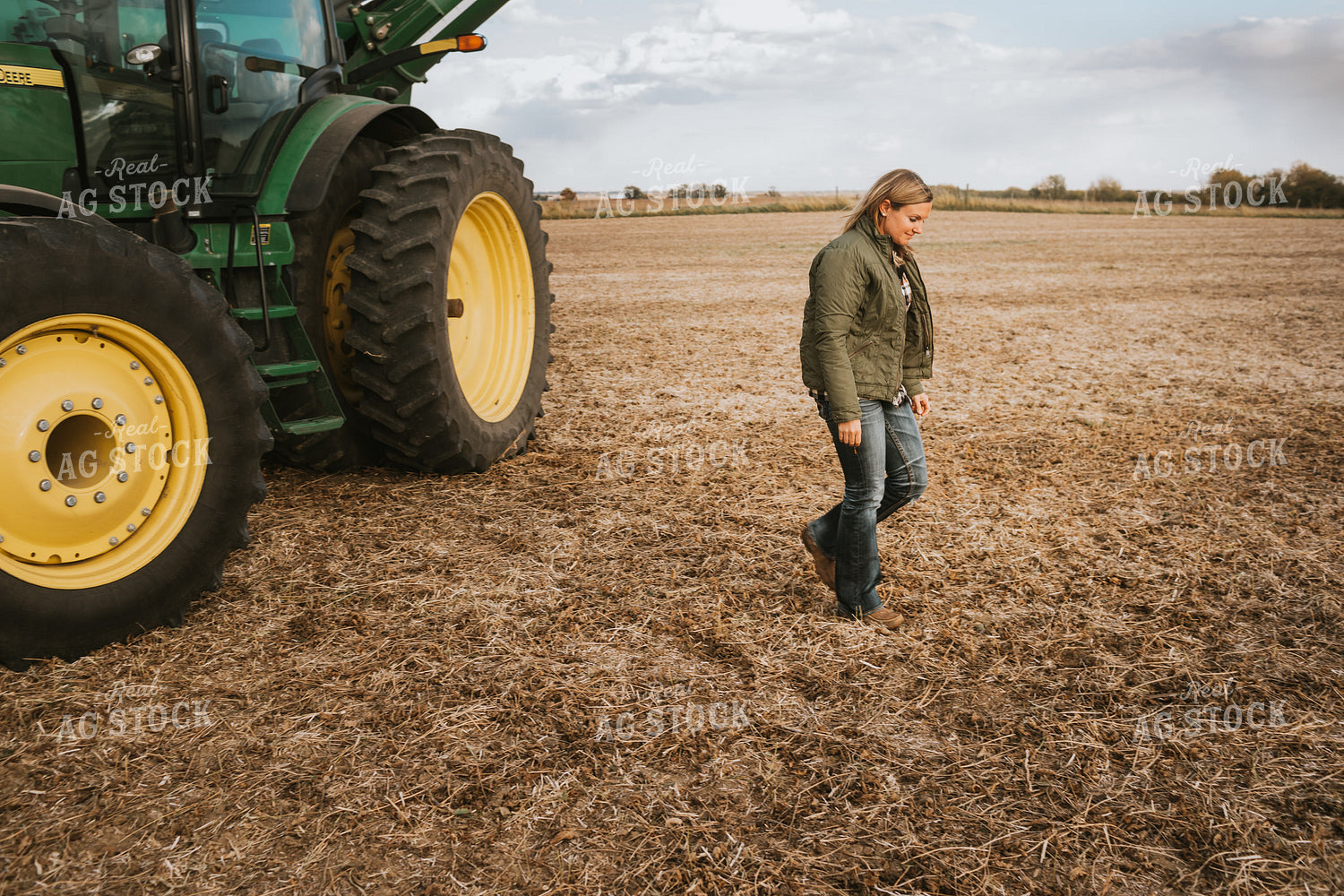 Female Farmer Getting out of Tractor 3508