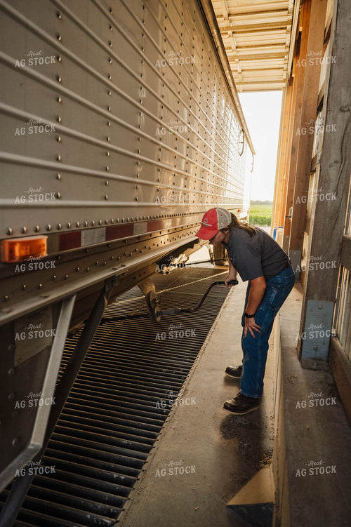 Female Farmer Dumping Semi 115254