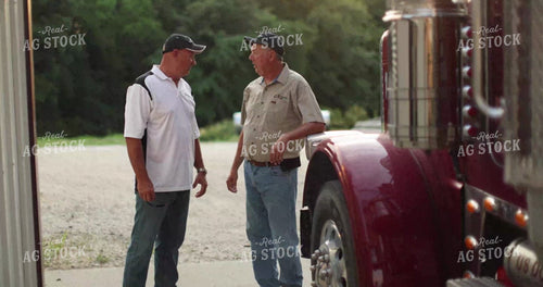 Farmers Talking by Semi 8674