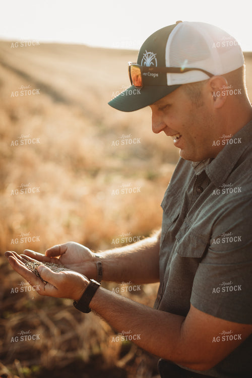 Farmer Agronomist Holding Rye Seed in Hand 5867