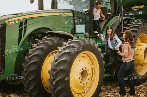 Farm Family Near Tractor 6598