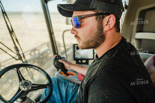 Farmer Driving Tractor 115222