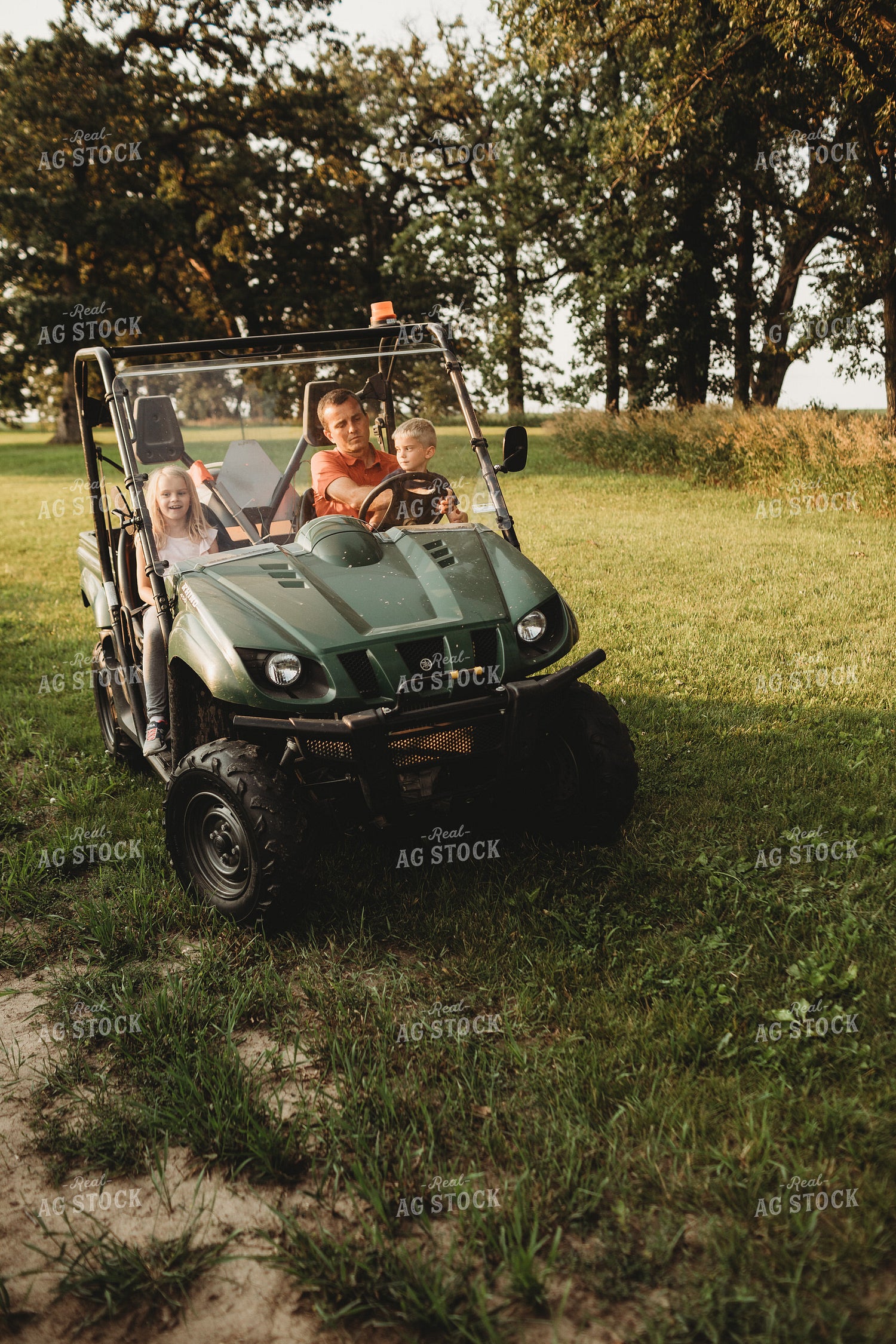 Farmer and Farm Kids in UTV 4540