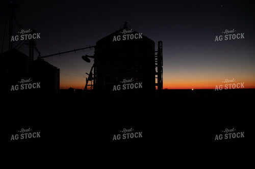 Grain Bin Silhouette at Sunrise 25851