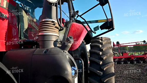 Farmer Climbing into the Tractor - 038