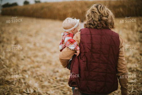 Farmer and Farm Kid in Field 6676