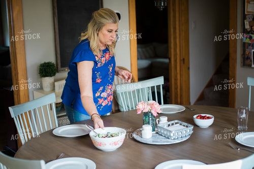 Farm Wife Setting Table for Meal 4410