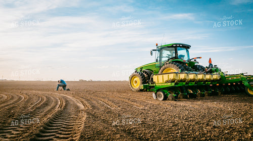 Farmer Touching Soil 56588