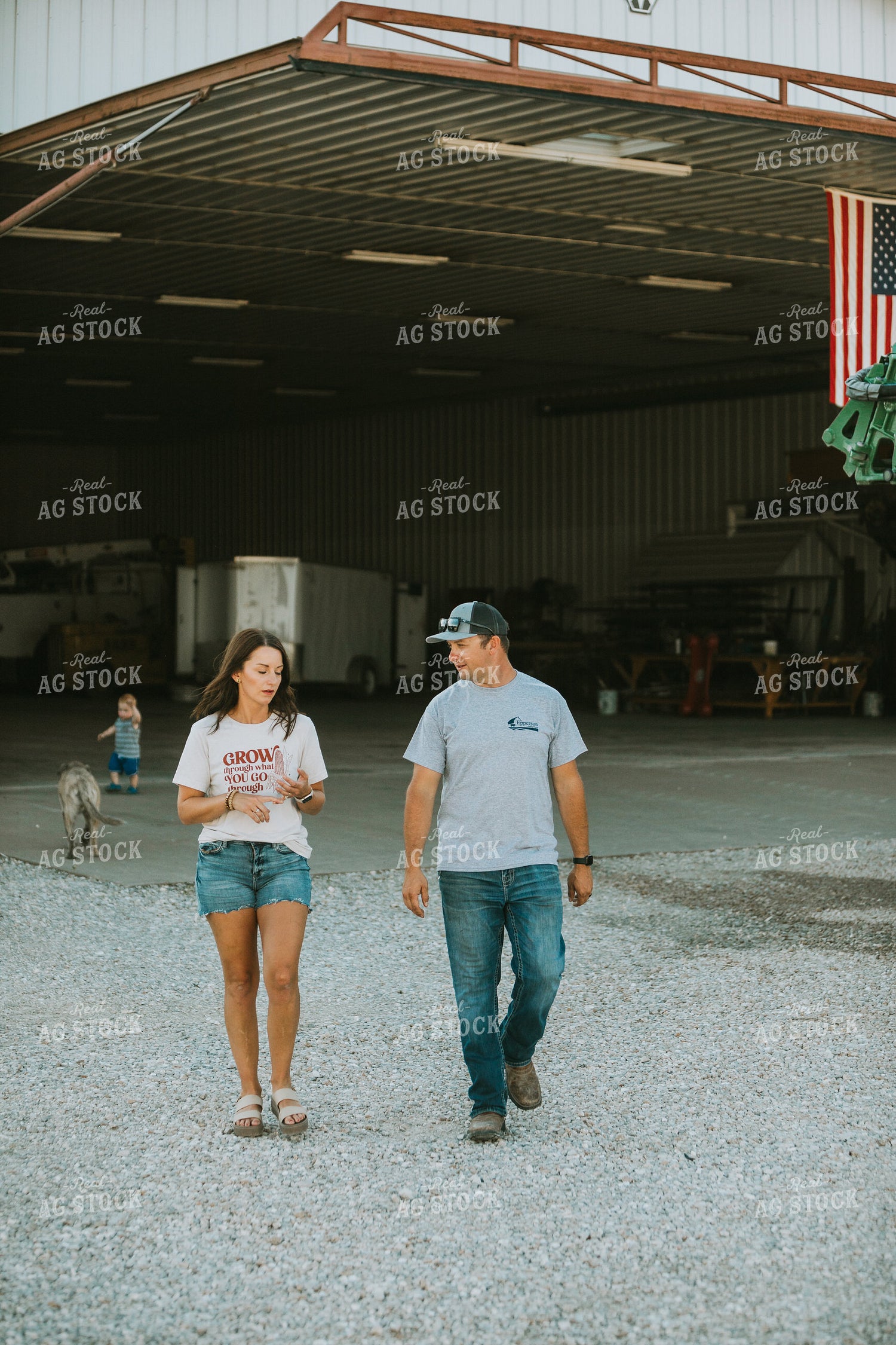 Farmer and Farm Wife Talking Outside Shop 6243