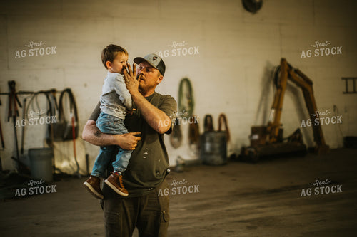 Farmer with Farm Kid in Shop 5133