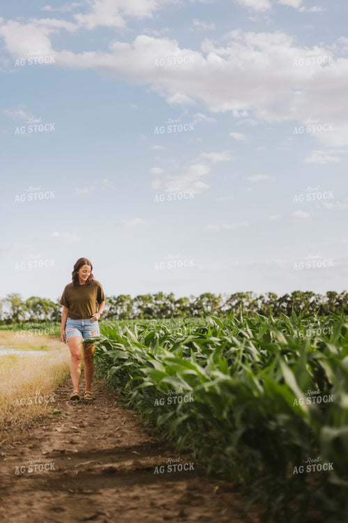 Female Farmer Checking Corn 8754