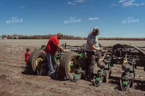 Farmer Filling Planter for Test Plot 196126