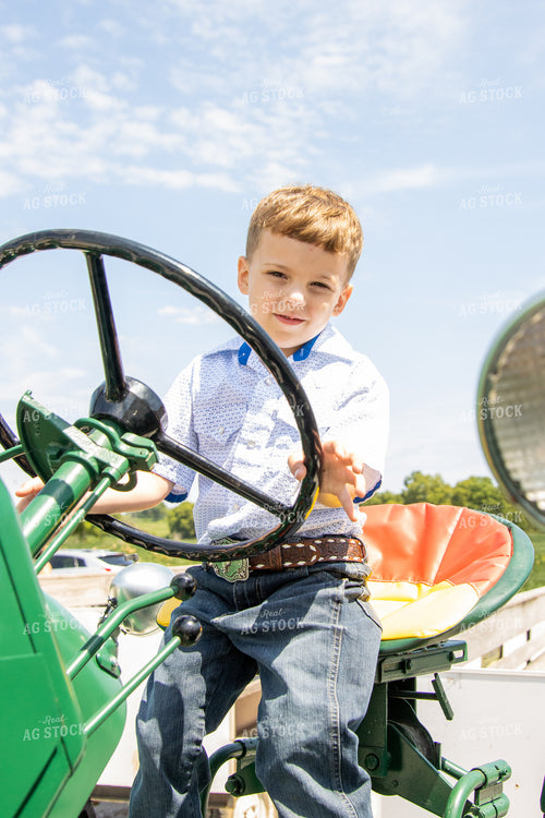 Farm Kid on Antique Tractor 52302