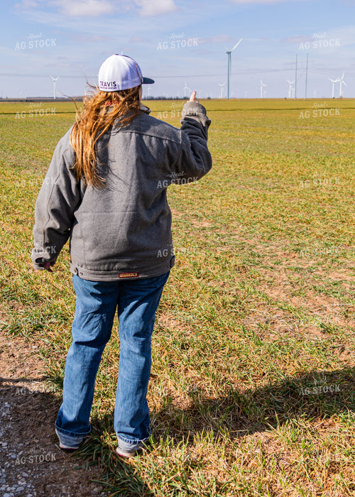 Rancher Pointing in Distance 231100