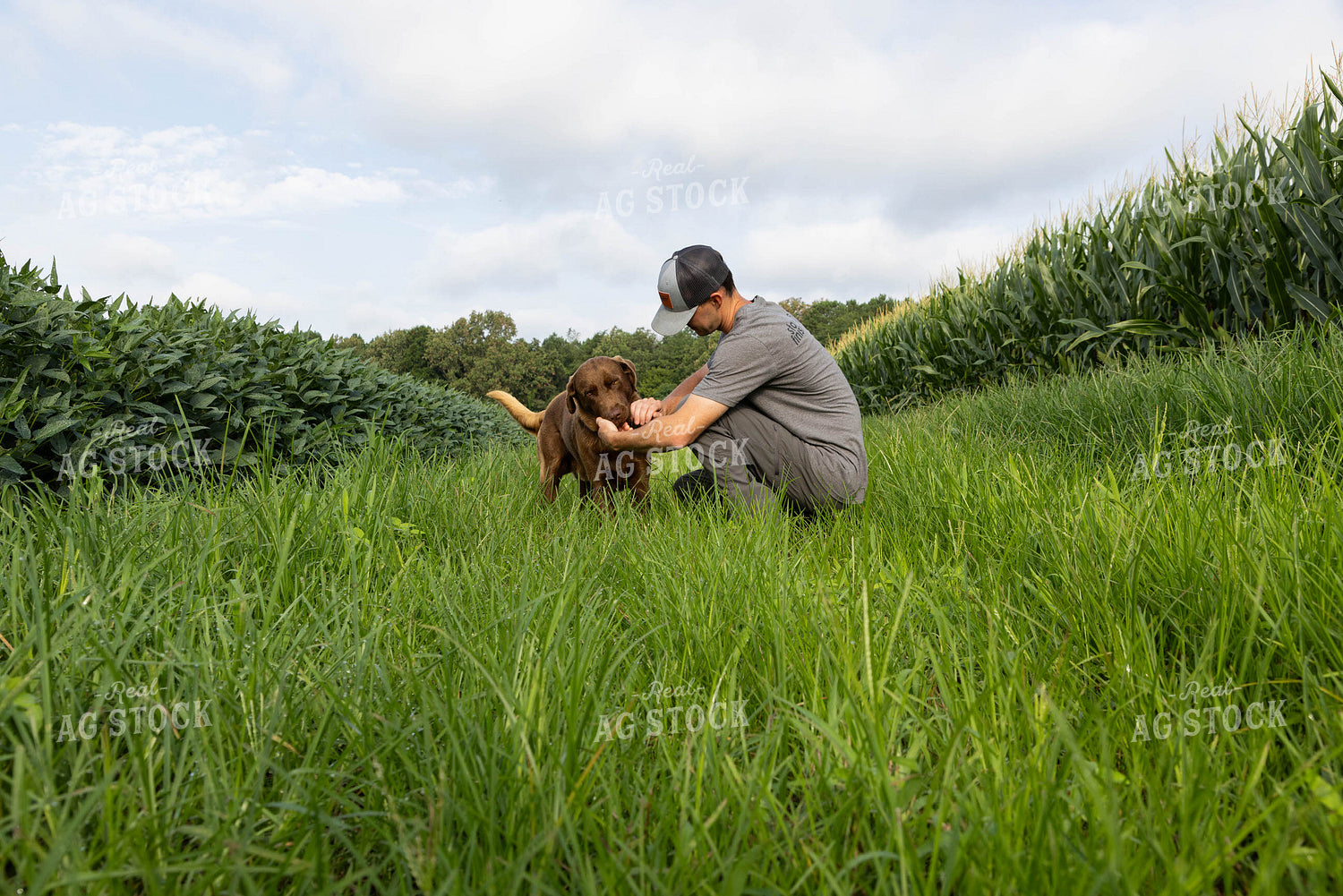 Farmer Bonding with Dog 79700