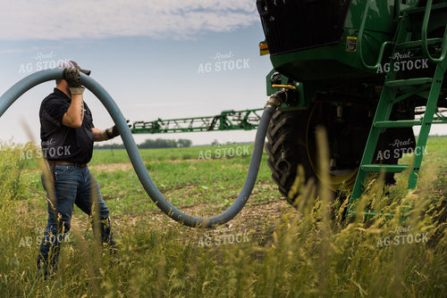 Applicator Filling Sprayer in Field 8010